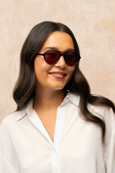 model wearing Hancock Sunglasses auburn lens black frame Rounder shape of the aviator
Classic teardrop shape
dual-plated hinges and original core wire
100% UV protection