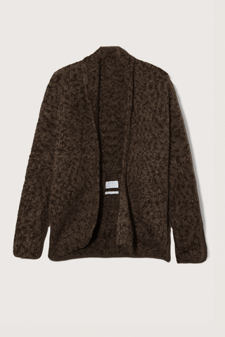 flat lay Hand Knit Paint Cocoon Black HANDKNIT
HAND PAINTED YARN
SURFACE IRREGULARITIES IN COLOR AND TONE
CIRCULAR CONSTRUCTION