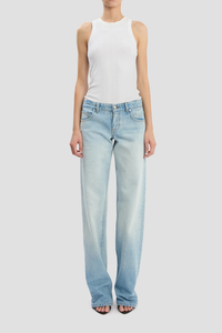 front profile model wearing Harper Mid Rise Zip Fly Jean Low rise
Heritage blue wash
Non-stretch
Mid-weight denim
Five pocket styling
Front zip fly
Branded leather patch and denim shank button