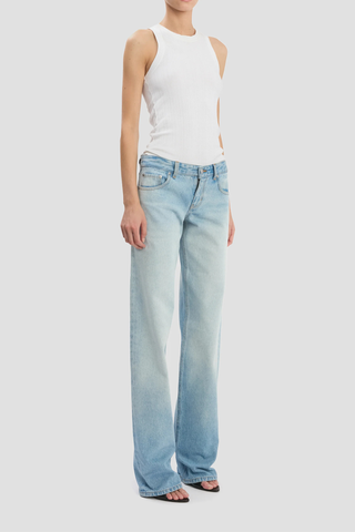 side profile model wearing Harper Mid Rise Zip Fly Jean Low rise
Heritage blue wash
Non-stretch
Mid-weight denim
Five pocket styling
Front zip fly
Branded leather patch and denim shank button