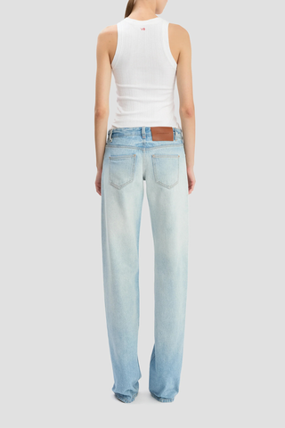 back profile model wearing Harper Mid Rise Zip Fly Jean Low rise
Heritage blue wash
Non-stretch
Mid-weight denim
Five pocket styling
Front zip fly
Branded leather patch and denim shank button