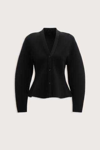 flat lay Henry Knit Cardigan black Compact knitted
Structured viscose yarn
Elegant rounded shoulder
Flared peplum hem front button closure