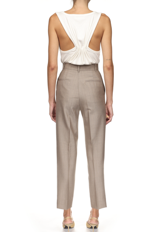 back profile model wearing High Waisted 3/4 Trouser limestone
slim tailored fit
100% Wool
Clasp closure
belt loop
zip closure