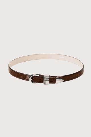 flat lay Hollyhock Belt Croc Silver Dark Chocolate 5 rings adornments
10 holes and an extended strap length to accommodate a broader range of sizes
Meticulously crafted from embossed Italian leather and silver hardware
Handcrafted in Italy
Silver Hardware
Genuine suede lining
1" Width