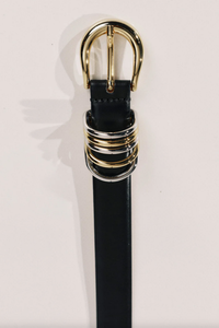 close up buckle detail of Hollyhock Mixed Metal Belt leather black stacked metal ring detail