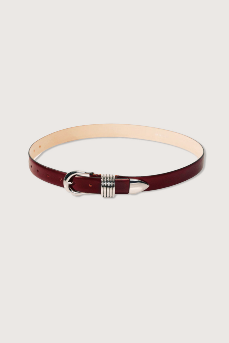 flat lay Hollyhock belt Silver hardware bordeaux leather with stack metal ring detail
