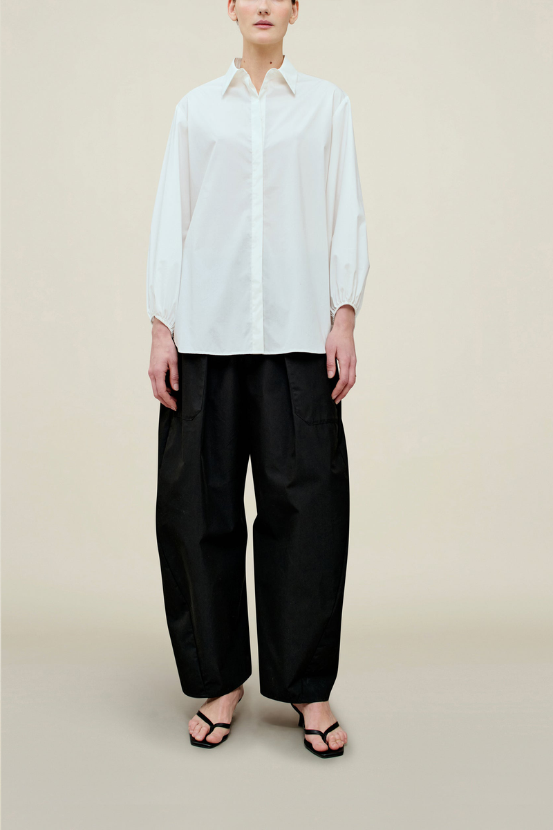 front profile model wearing Ilia Balloon Sleeve Blouse white