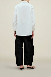 back profile model wearing Ilia Balloon Sleeve Blouse white