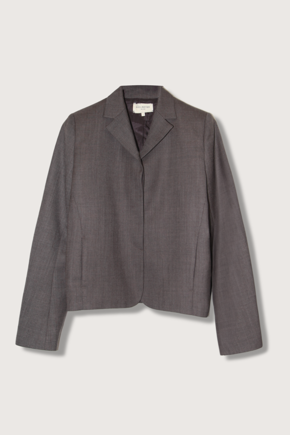 flat lay Iman Shrunken Blazer brown wool suiting Shrunken silhouette, Full length sleeves, High break lapel