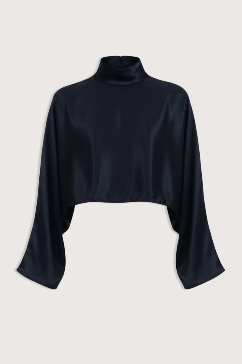 flat lay Ingrid Mock Neck Crop Top Black High neck
Clean hem design
Crop length
Flare sleeve
73% Acetate 27% Polyester