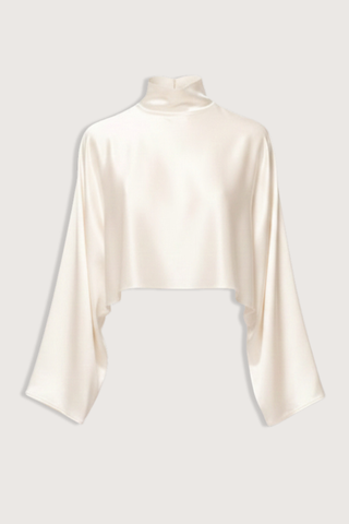 flat lay Ingrid Mock Neck Crop Top Champagne High neck
Clean hem design
Crop length
Flare sleeve
73% Acetate 27% Polyester