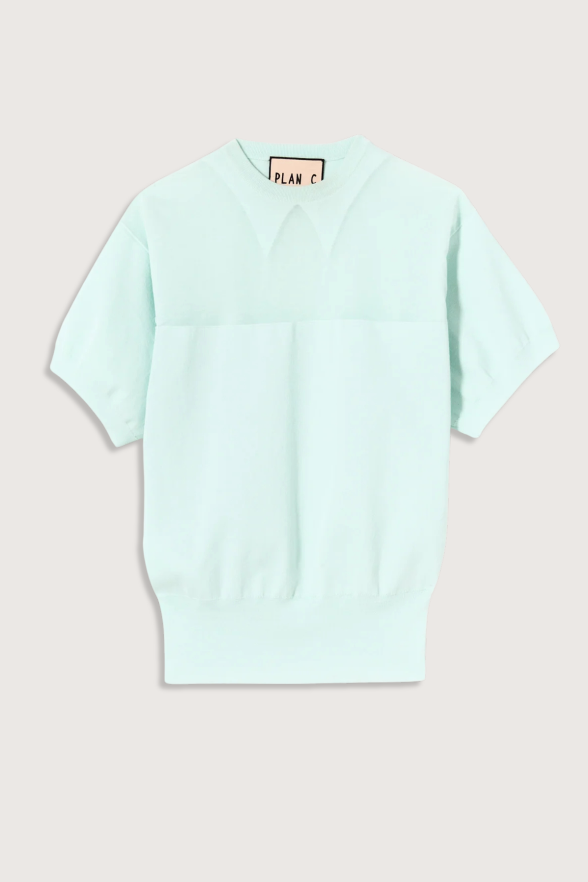 flat lay Intarsia Crew Neck Top powder blue intarrsia crew neck knit
Short sleeves
Ribbed hem