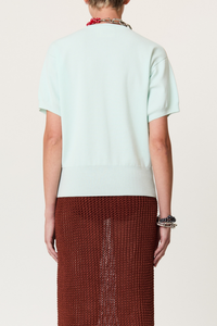 back profile model wearing Intarsia Crew Neck Top powder blue intarrsia crew neck knit
Short sleeves
Ribbed hem