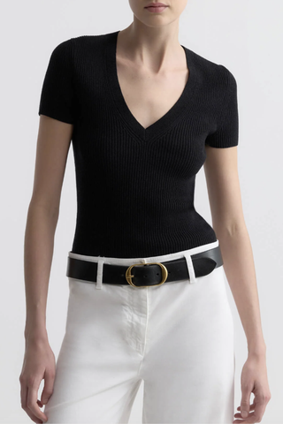 front profile model wearing  Italia Short Sleeve Top Black Deep v-neck
Rib knit
Fitted body
55%COTTON 45%SILK