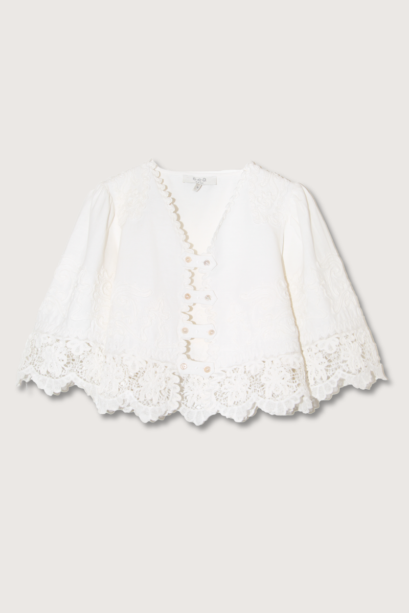 flat lay  Iyla Soutache Short Sleeve Top white with cropped silhouette and detailed button front closures.