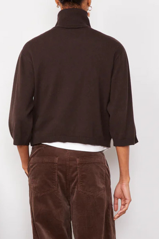 back profile model wearing Jalila Sweater Dark Brown boxy fit cashmere wool turtleneck with half sleeves
