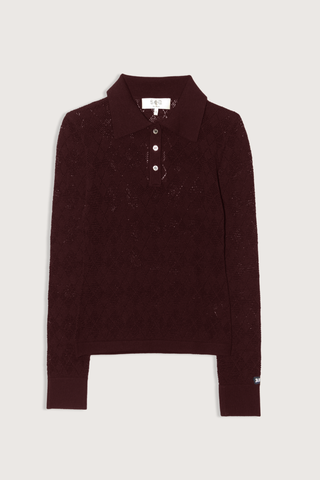 flat lay Jane Polo Sweater Burgundy Argyle polo sweater
Intricate argyle knit
Long sleeves
Custom patch at the sleeve
100% merino wool
Partial button front
Slimmer fit