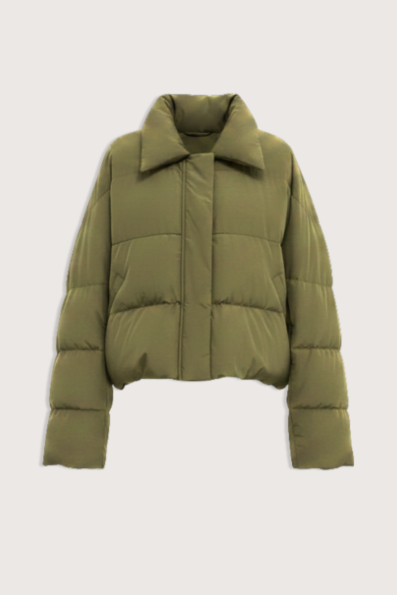 flat lay Jani Puffer Jacket Olive Cropped signature down jacket
Soft water-repellent nylon
Oversized silhouette
Voluminous sleeves
Statement collar
Concealed snap buttons
Zip closure
Adjustable drawcord hem
100% Nylon