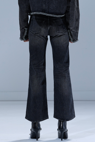 back profile model wearing Joan Kick Flare Jean Kenet Black relaxed fit vintage dark wash 