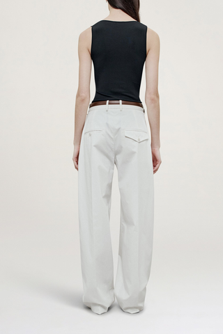 back profile model wearing Joel Pleated Starched Poplin Trouser ivory cotton Relaxed-fit
Pleated trouser
Starched poplin
Wide leg
Impeccably tailored
Mid-high rise trouser
Elongating double pleated crease front leg
Side seam pockets
Two back welt pockets
Wide looped waistband