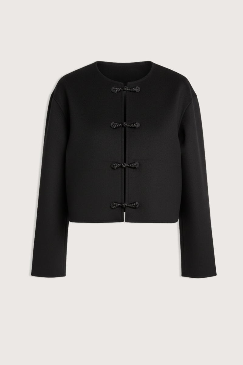 flat lay Joella Double Face Split Jacket black
Straight fit
Cropped length
Round neck
Frog fastening
100% Wool
Shaped sleeve with dart and under-sleeve panel