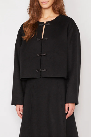 front profile model wearing Joella Double Face Split Jacket black
Straight fit
Cropped length
Round neck
Frog fastening
100% Wool
Shaped sleeve with dart and under-sleeve panel