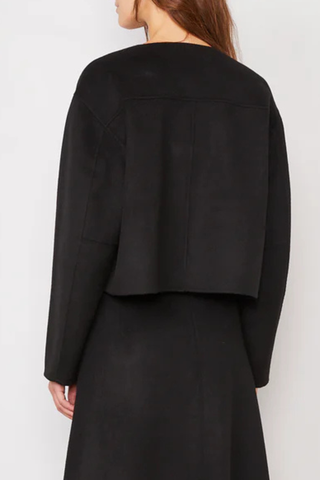 back profile model wearing Joella Double Face Split Jacket black
Straight fit
Cropped length
Round neck
Frog fastening
100% Wool
Shaped sleeve with dart and under-sleeve panel