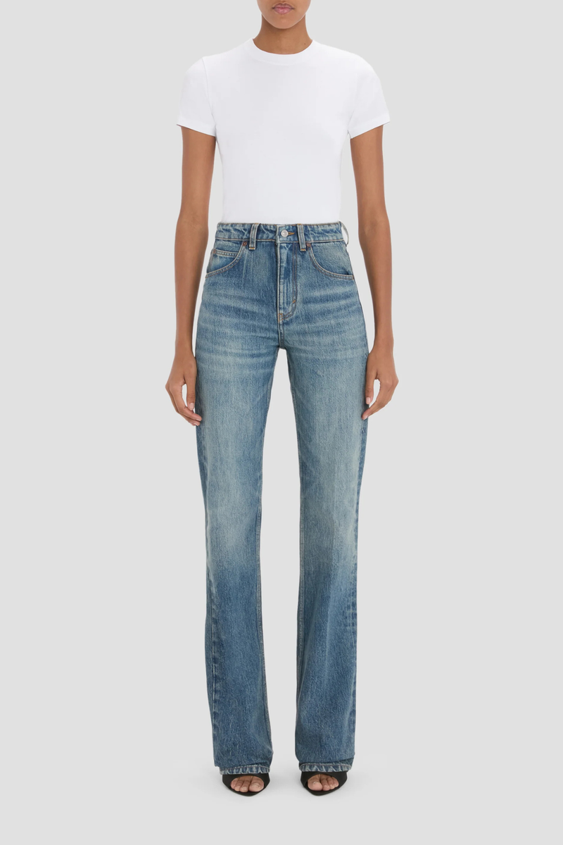front profile model wearing Julia Stretch Straight Leg Jean worn blue mid wash cotton
High waisted
5 pocket styling
Leather patch
Belt loops
Button fly
Tobacco topstitching details
Branded hardware