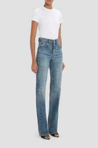 side profile model wearing Julia Stretch Straight Leg Jean worn blue mid wash cotton
High waisted
5 pocket styling
Leather patch
Belt loops
Button fly
Tobacco topstitching details
Branded hardware