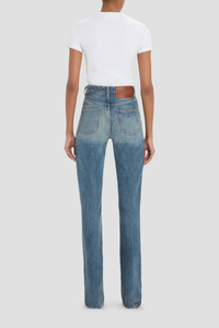back profile model wearing Julia Stretch Straight Leg Jean worn blue mid wash cotton
High waisted
5 pocket styling
Leather patch
Belt loops
Button fly
Tobacco topstitching details
Branded hardware
