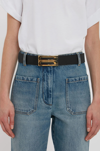 model wearing Jumbo Frame Shiny Calf Belt Black thick leather Smooth Calf Leather
Luxury signature logo gold plated hardware