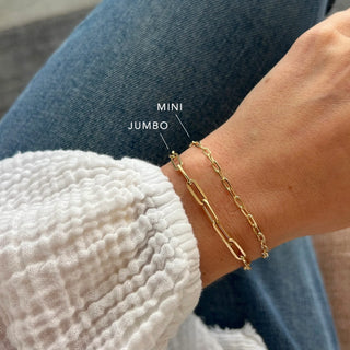 model wearing both mini and Jumbo Link Bracelet 14k gold comparison