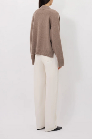 back profile model wearing Kaia Lds V-Neck Cashmere Cardigan taupe melange v-neck three front buttons