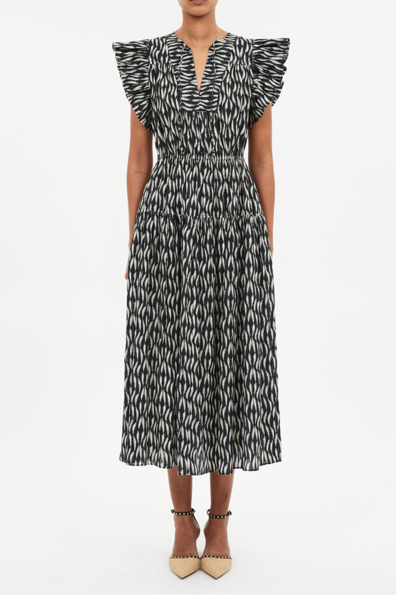 front profile model wearing Kairi Sleeveless Dress Batik floral print
Midi length
V-neckline with ties
Flutter sleeves