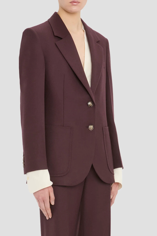 side profile model wearing Katherine Flannel Jacket acai red Compact flannel
Refined, modern silhouette
Single breasted and regular shoulder
Tailored collar and lapel with under melton detail
Patch pockets
Hip length
100% Virgin Wool
