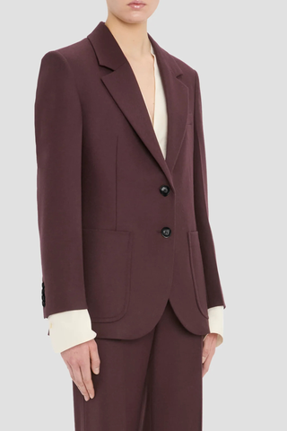 side profile model wearing Katherine Flannel Jacket acai red Compact flannel
Refined, modern silhouette
Single breasted and regular shoulder
Tailored collar and lapel with under melton detail
Patch pockets
Hip length
100% Virgin Wool