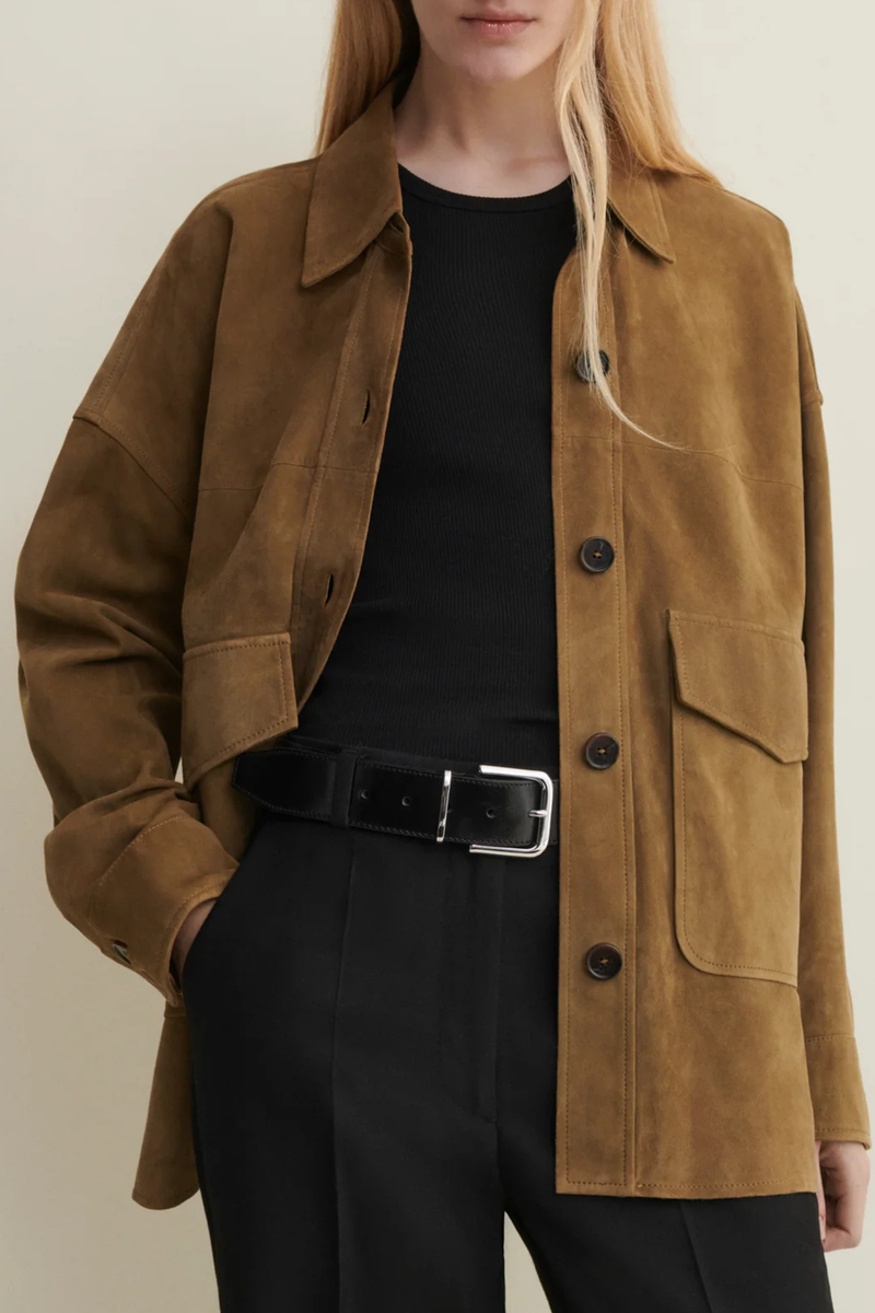 front profile model wearing Kaylee Lamb Suede Shirt Jacket Olive Designed for a relaxed, slightly oversized fit  front button closure two front flap pockets