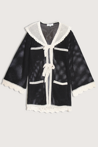 flat lay Kendall Crochet Cover Up black white Crochet
Two front ties
Scallop lace detailing
Contrast white crocket pocket design
Large sailor collar