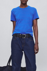 front profile model wearing  Kenzie Stripe Short Sleeve T-Shirt Cobalt blue
Relaxed boxy crop
crewneck
Features contrast Kallmeyer embroidery at hem
100% Cotton