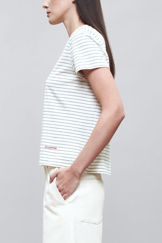 side profile model wearing  Kenzie Stripe Short Sleeve T-Shirt Ivory/Heather cotton Short sleeve
Handmade custom stripe
Relaxed boxy fit
Subtle cropped length
Roomy sleeves
Slight taper at waist