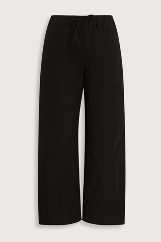flat lay Kyoto Carpenter Pant Black cotton Classic utility inspired trouser
Pull-on style
Baggy leg silhouette
Hits at the ankle
Topstitched utility panels at front
Adjustable waistband
Patch pockets at back