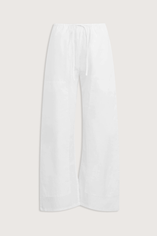 flat lay Kyoto Carpenter Pant White cotton Classic utility inspired trouser
Pull-on style
Baggy leg silhouette
Hits at the ankle
Topstitched utility panels at front
Adjustable waistband
Patch pockets at back