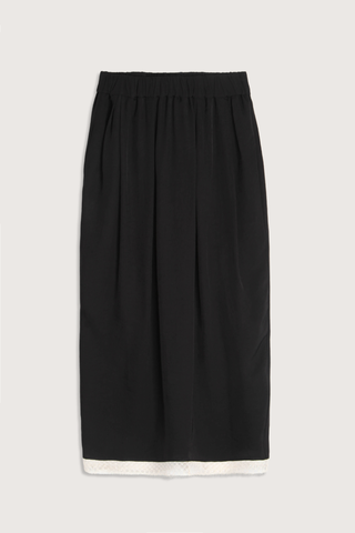 flat lay Lace Tulip Skirt Black
Elastic waistband
Hidden side pockets
Bouncy, lightweight Japanese Naia twill
Midi length
Slit at back
White lace hem
