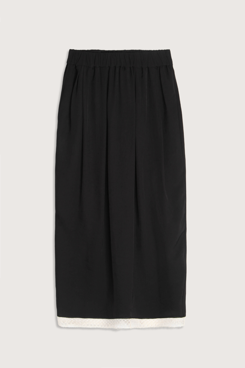 flat lay Lace Tulip Skirt Black
Elastic waistband
Hidden side pockets
Bouncy, lightweight Japanese Naia twill
Midi length
Slit at back
White lace hem
