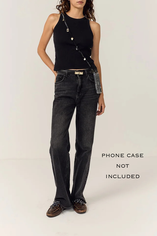 front profile model wearing  Laia Long phone Chain Noir Straps can be worn on the shoulder, in the hand or even hung on your bag for a new handle.
Can remove the chain easily and at any time, and exchange it
Can adapt your hull with different chains
Attach to universal adapter, available to purchase separately.
Phone case is sold separately
Fabric bandana
Charms included