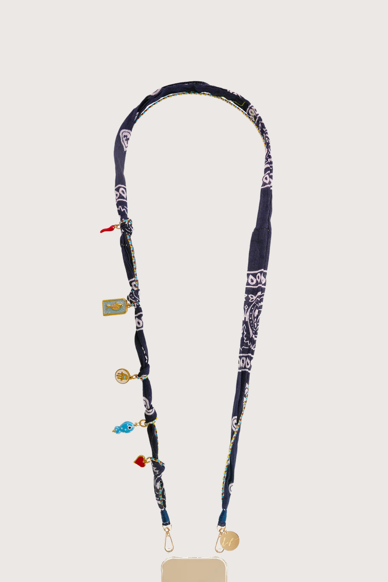 flat lay Laia Long Phone Chain Blue Straps can be worn on the shoulder, in the hand or even hung on your bag for a new handle.
Can remove the chain easily and at any time, and exchange it
Can adapt your hull with different chains
Attach to universal adapter, available to purchase separately.
Phone case is sold separately
Fabric bandana
Charms included