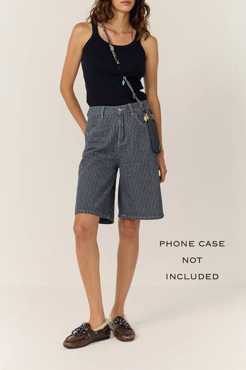 front profile model wearing Laia Long Phone Chain Blue Straps can be worn on the shoulder, in the hand or even hung on your bag for a new handle.
Can remove the chain easily and at any time, and exchange it
Can adapt your hull with different chains
Attach to universal adapter, available to purchase separately.
Phone case is sold separately
Fabric bandana
Charms included