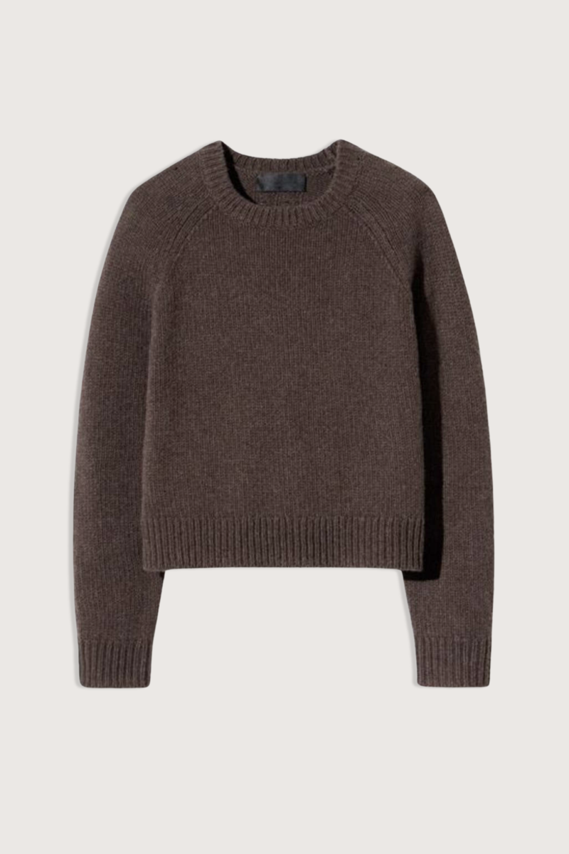 flat lay Laurel Wool/Cashmere Crewneck Sweater walnut heather Long sleeve
Medium weight
Jersey stitch
Shrunken fit
Regular length raglan sleeve
1x1 rib at hem and cuff
Neck trim in 1x1 rib
Fashioning at armhole and sleeve
Signature center back cable knit detail
50% Cashmere, 50% Virgin Wool