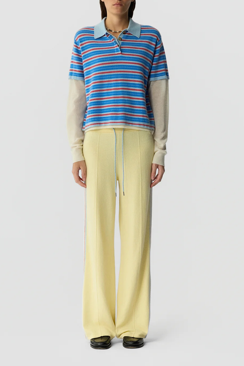 front profile model wearing Layered Stripe Rugby Cashmere Clear Sky Combo LIGHT-WEIGHT STRIPED RUGBY
RIB POLO COLLAR
HIDDEN THREE BUTTON HALF PLACKET CLOSURE
DOUBLE LAYER SLEEVE- LONG SLEEVE IN FEATHER WEIGHT CASHMERE WITH RIB CUFF
DOUBLE LAYER HEM TRIM WITH SIDE SLIT
BACK NECK GIR BRANDING