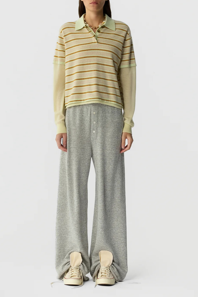 front profile model wearing Layered Stripe Rugby Cashmere Limewash Combo LIGHT-WEIGHT STRIPED RUGBY
RIB POLO COLLAR
HIDDEN THREE BUTTON HALF PLACKET CLOSURE
DOUBLE LAYER SLEEVE- LONG SLEEVE IN FEATHER WEIGHT CASHMERE WITH RIB CUFF
DOUBLE LAYER HEM TRIM WITH SIDE SLIT
BACK NECK GIR BRANDING